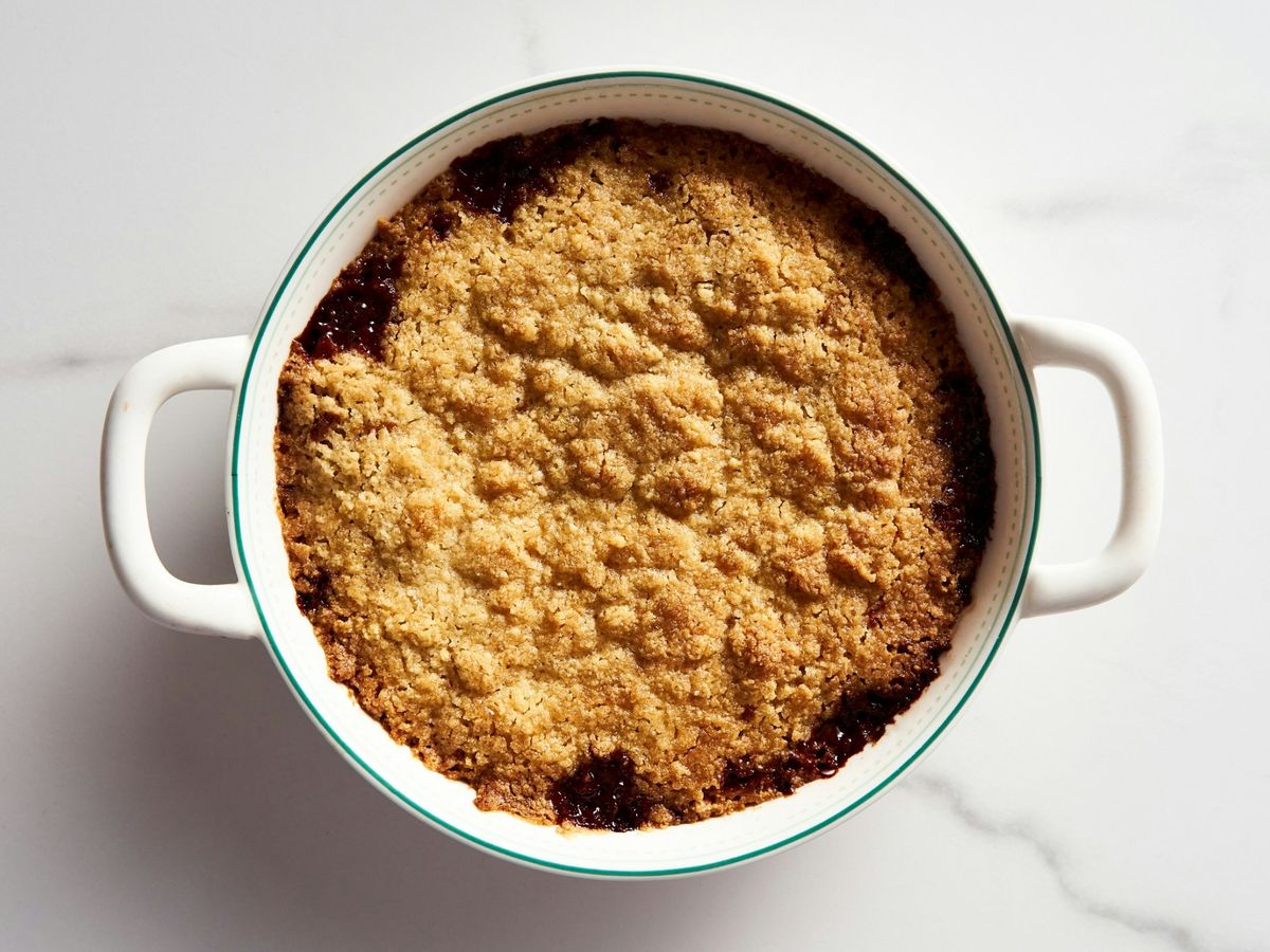 Apple crumble in a white baking dish